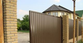 Купить откатные ворота из профнастила Сосногорск, цена от 1798 руб.